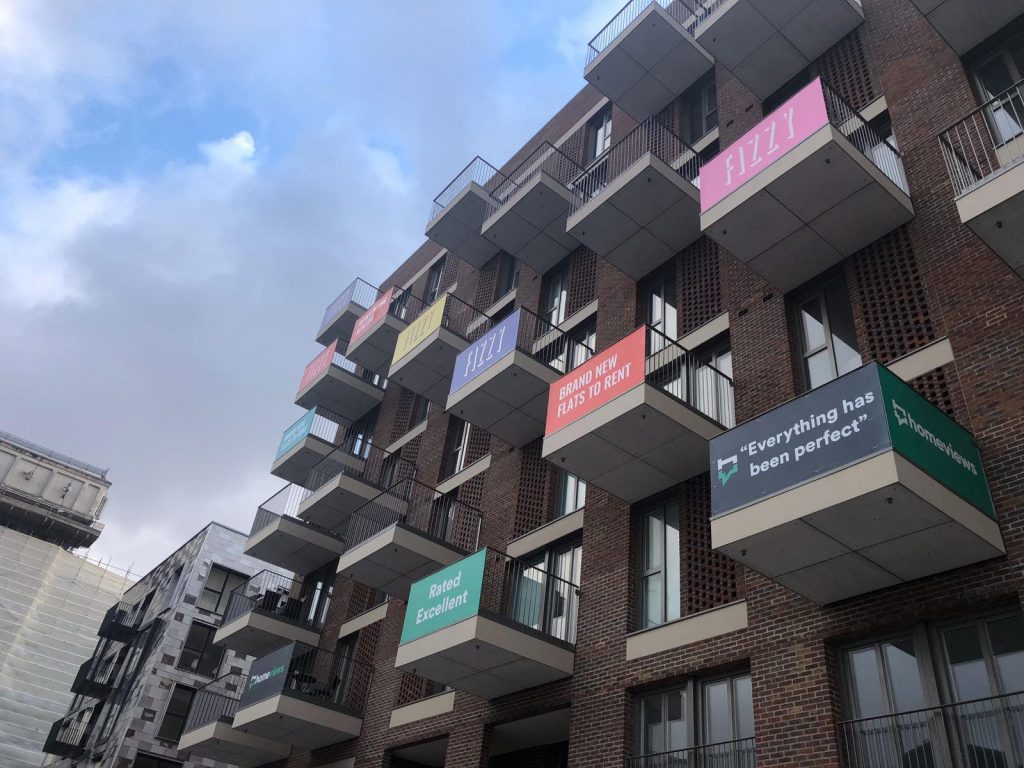 Advertisements on apartment balconies