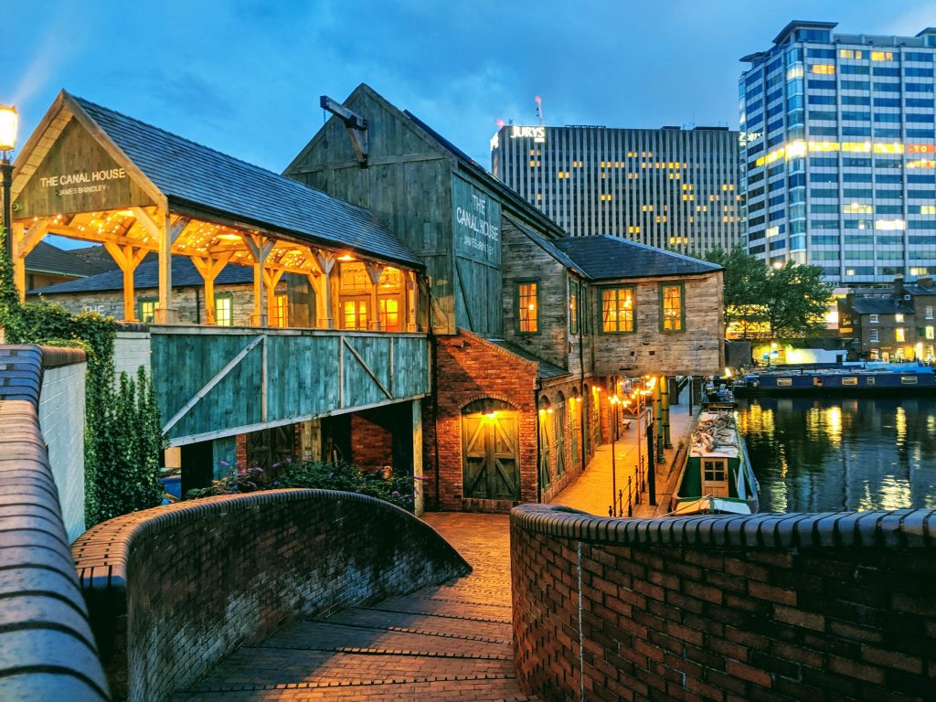 Old canal building in front of Office blocks in Birmingham, West Midlands