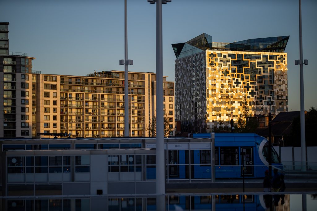 New flats behind a train line