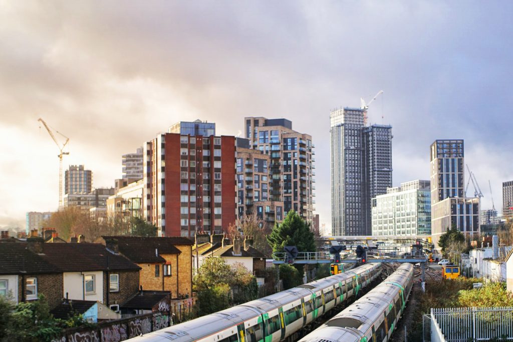 Trainline with new flats in the background