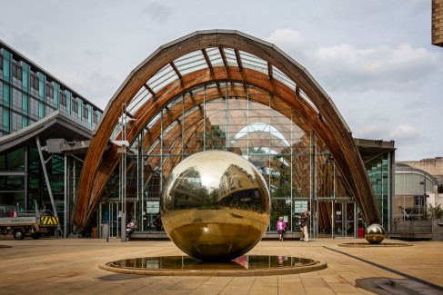 Steel ball in front of the Winter Gardens at St Paul's Place, Sheffield