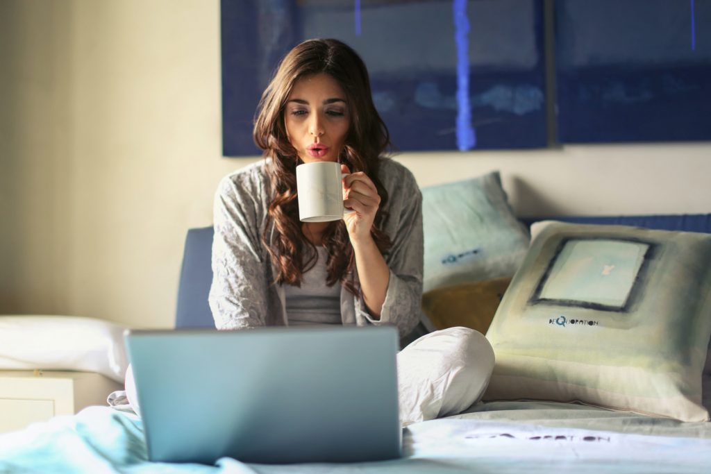 woman researching on laptop