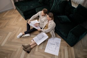 Couple on floor on new help to buy home.