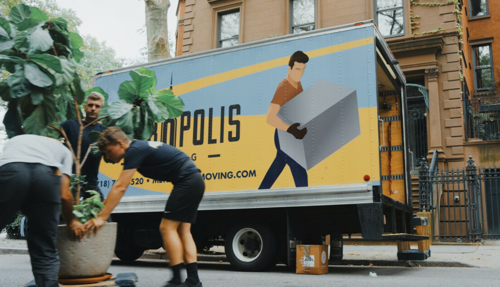 removals van outside an apartment building